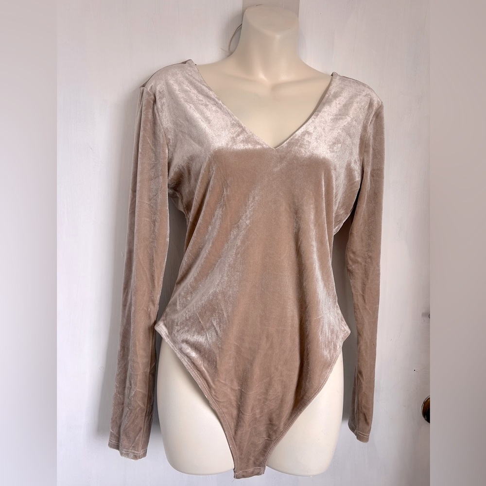 GB Brand Champagne Bodysuit. Super soft. New with tags. Beautiful. Size medium.